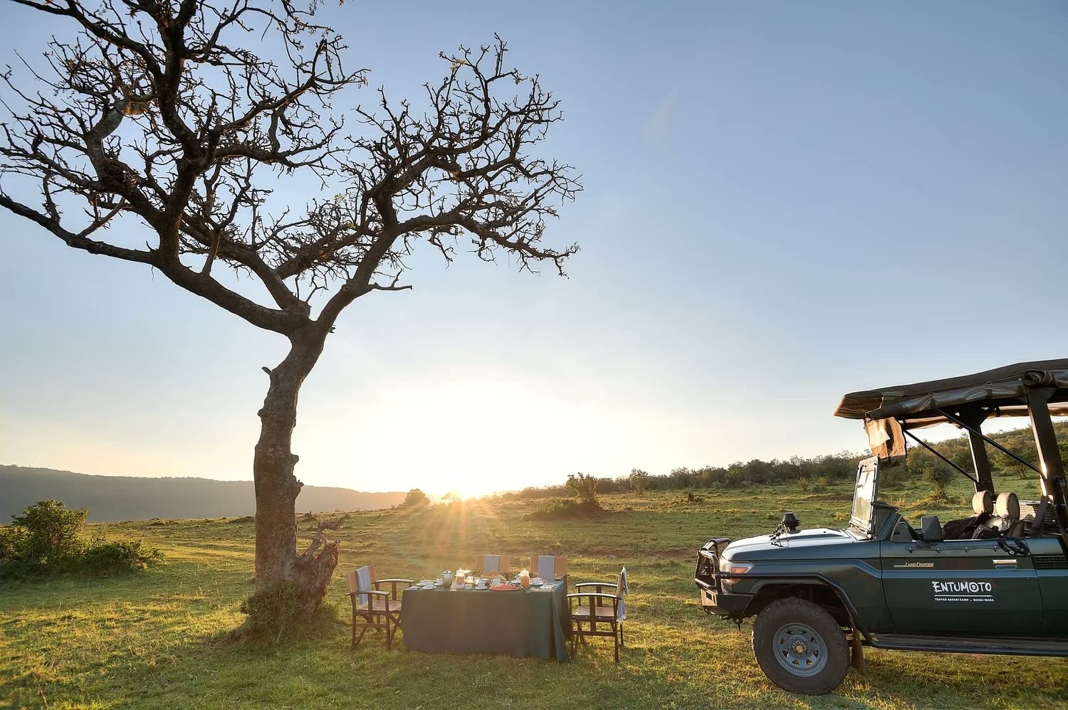 A tent veranda at Entumoto Safari Camp at golden hour